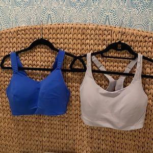 2 Lululemon Sports Bras. Size 36DD. 1 royal blue, 1 light gray.